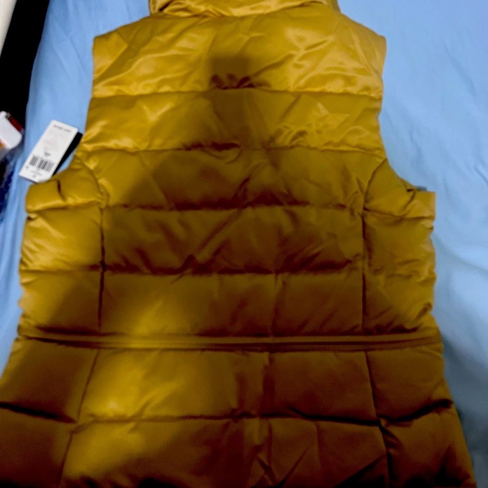 Lovely Vest can be worn during the Cool weather with jeans etc!